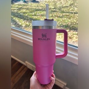 Stanley quencher. Pink is 40oz and turquoise is 30oz.